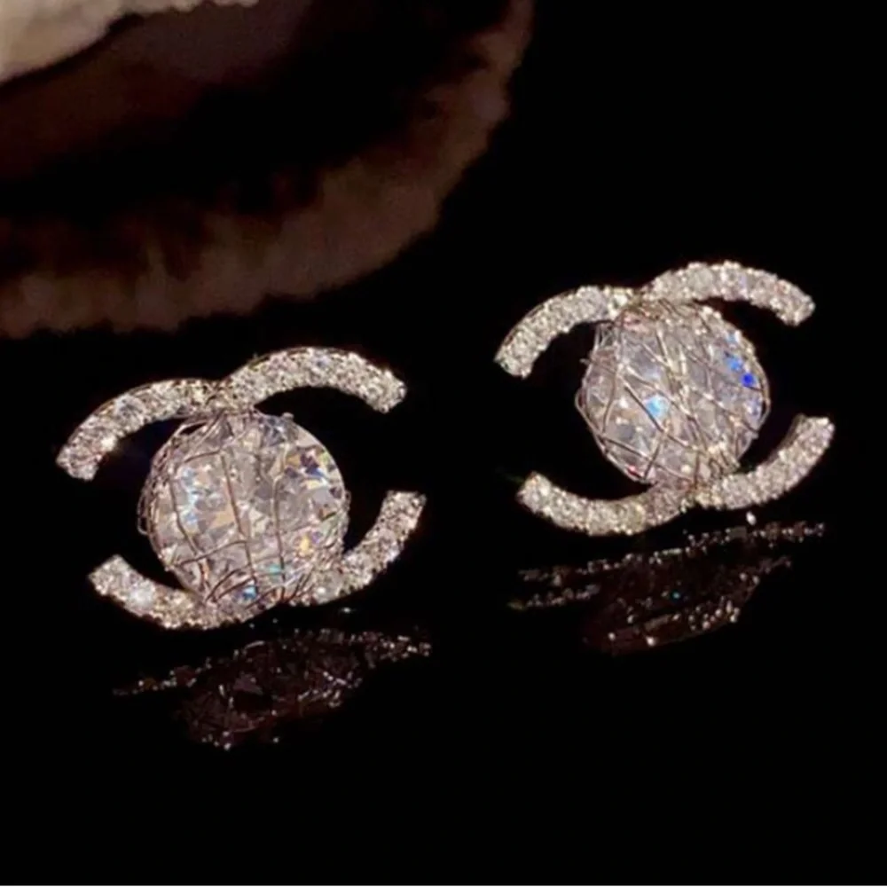 Elegant Silver Crystal Stud Earrings - Picture 1 of 6